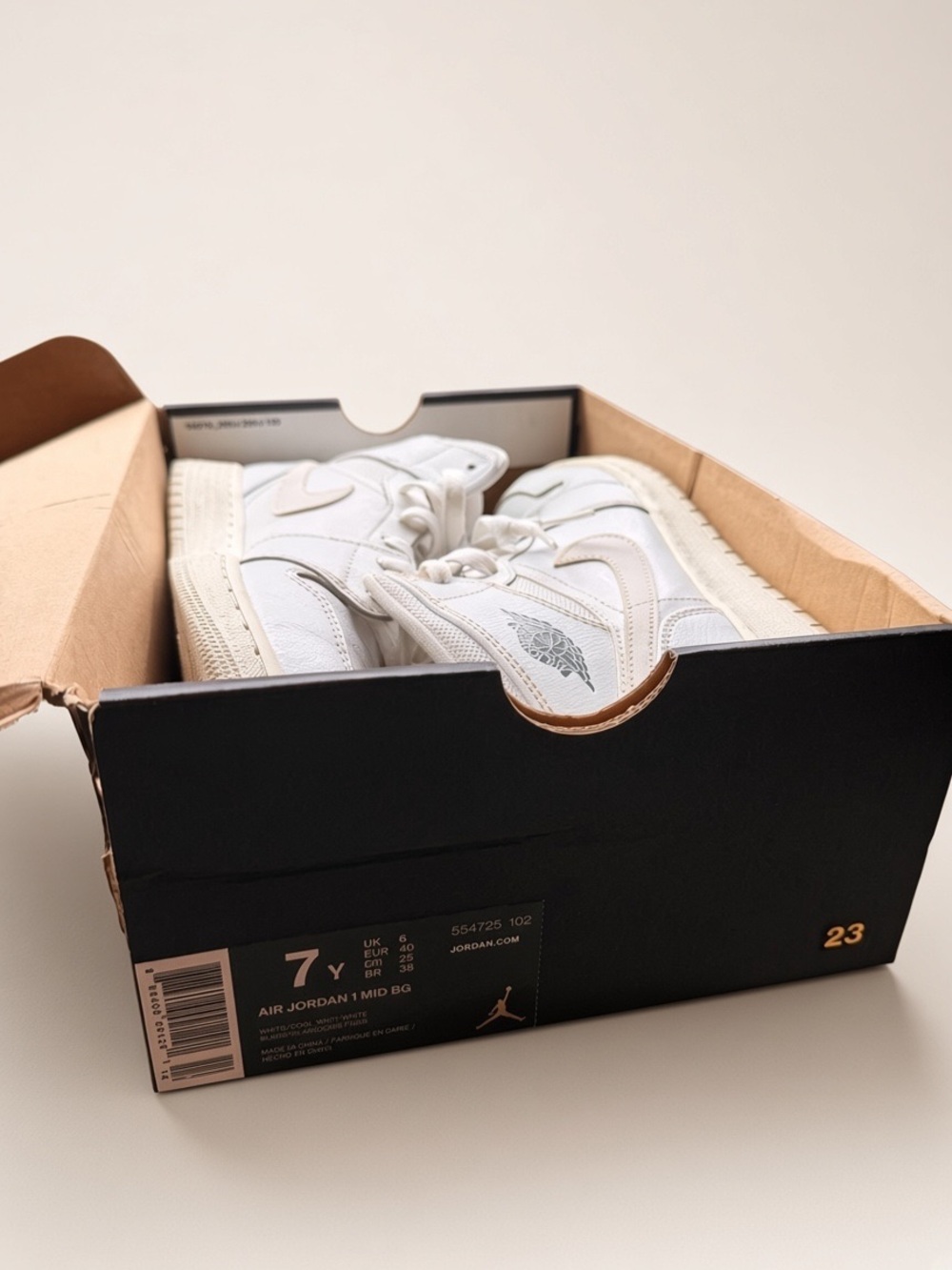 Jordan White Mid-Top Retro Sneakers